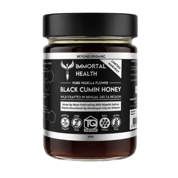 Jar of Immortal Health Black Cumin Honey with label reading 'Beyond Organic' and 'Wild Crafted in Bengal Delta' 325g, dark amber glass